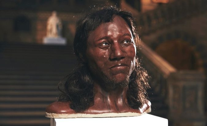 A likeness of Cheddar Man, Britain's oldest known almost complete human skeleton, is seen at the Natural History Museum, after genetic research concluded that he was dark skinned.