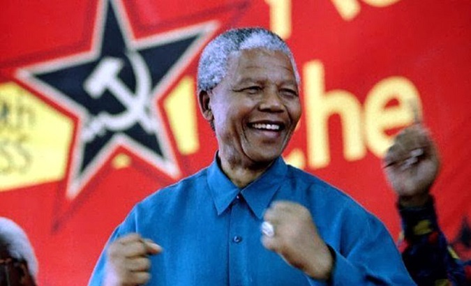 Nelson Mandela attends the congress of the South African Communist Party, which he said was a unique ally to the African National Congress, in 1995.