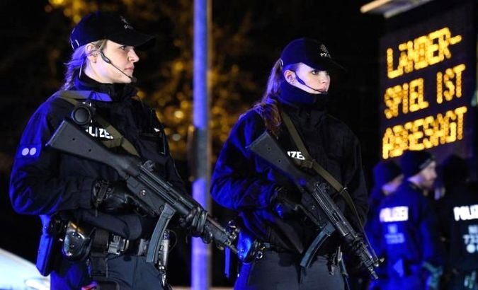 Netherlands pushes threat level to four out of a maximum five after police arrest suspected terrorists.
