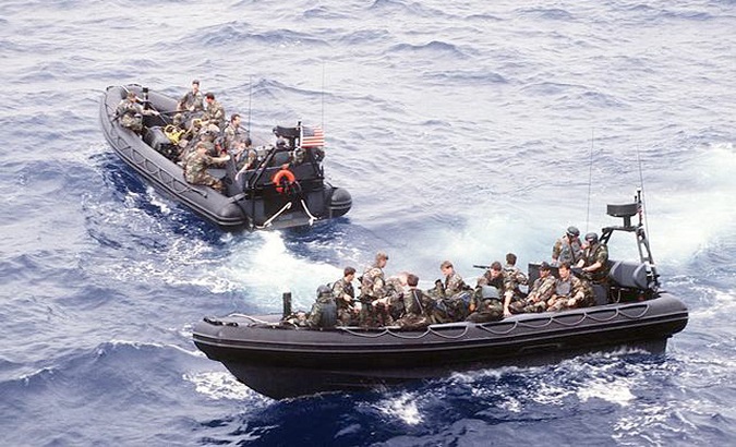 This undated US Navy file image obtained from the US Department of Defense 26 September 2001 shows members of a Navy Sea-Air-Land (SEAL) team