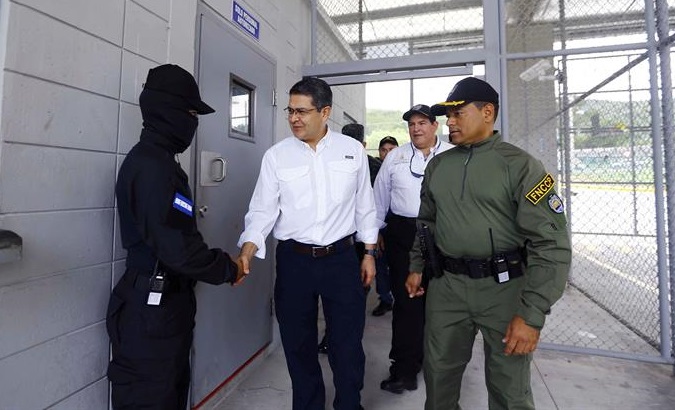 The President of Honduras, Juan Orlando Hernandez, visiting a high security prison in Santa Barbara, Honduras. Nov. 19, 2018.