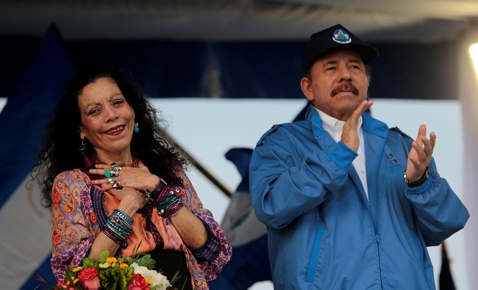Nicaraguan President Daniel Ortega (R) and Vice-President Rosario Murillo