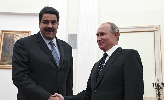 Russian President Vladimir Putin (R) shakes hands with his Venezuelan counterpart Nicolas Maduro during a meeting at the Kremlin in Moscow, Russia Oct. 4, 2017.