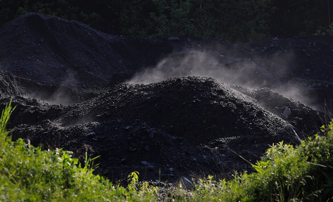 Steam rises from a pile of coal at a mine in Bishop, West Virginia, U.S. on May 19, 2018.