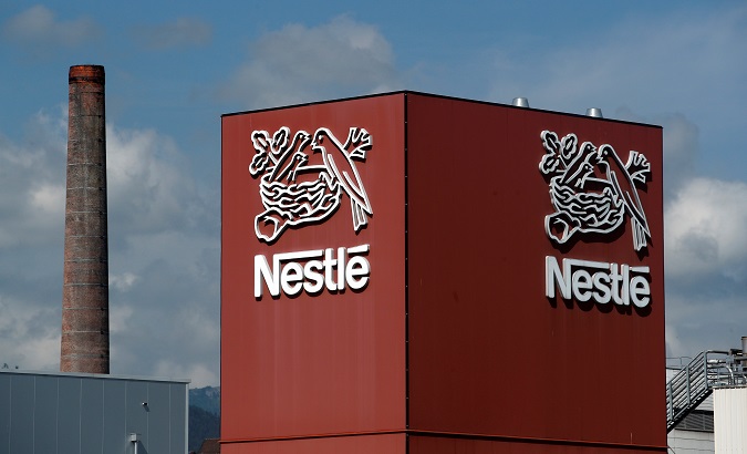 A Nestle logo is pictured on a coffee factory in Orbe, Switzerland May 31, 2018.