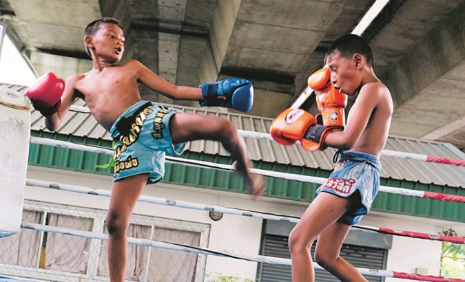 The tragic death of Anucha Kochana, 13, who died after a brutal kickboxing match, reignited calls to ban underage boxing.