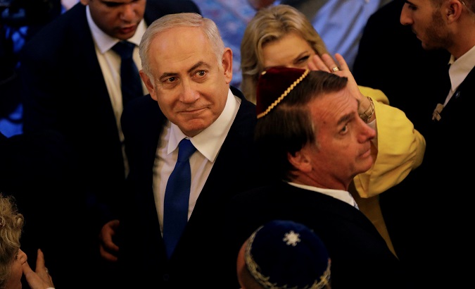 Israeli Prime Minister Benjamin Netanyahu and Brazil's President-elect Jair Bolsonaro leave a synagogue in Rio de Janeiro, Brazil December 28, 2018.