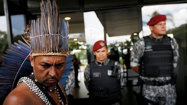 Brazil's new President Bolsonaro gave farm ministry power to decide on Indigenous land. 