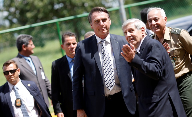 President Jair Bolsonaro (L) and Augusto Heleno, Minister of institutional security, in Brasilia, Brazil Jan. 3, 2019.