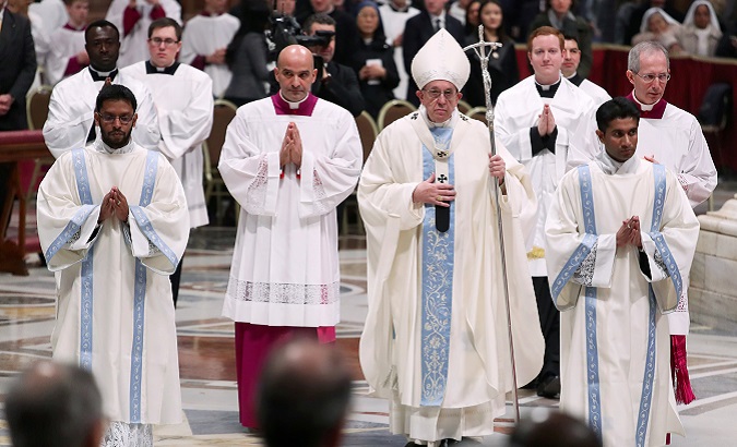 Pope Francis leads a mass to mark the World Day of Peace in Saint Peter's Basilica at the Vatican Jan. 1.