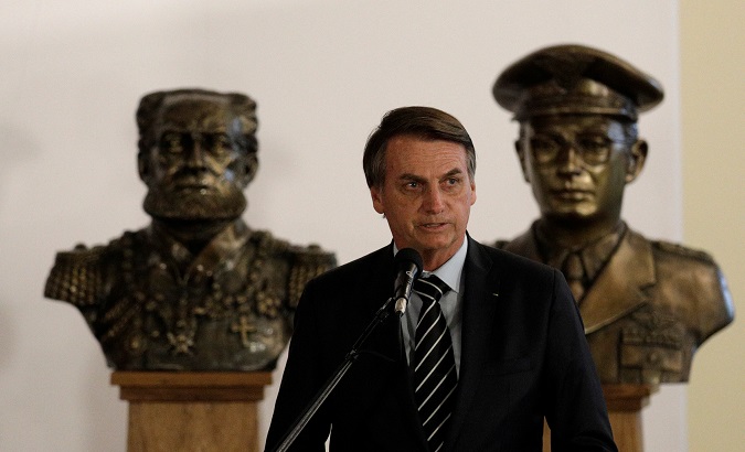 Brazil's President Jair Bolsonaro attends the handover of his new Defence Minister Fernando Azevedo e Silva in Brasilia.