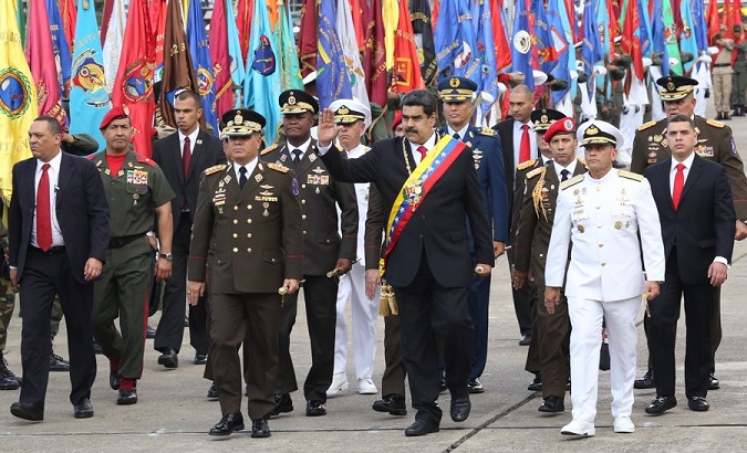 Venezuela's armed forces have pledged allegiance to Nicolas Maduro as president and commander-in-chief.