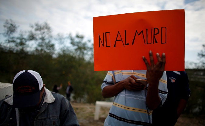 Migrants from Central America protest at Reynosa-McAllen border crossing ahead of Trump's visit, Mexico, January 10, 2019.