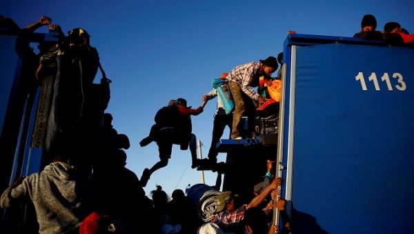 Migrants from Central America board a truck to Tijuana from Mexicali in Mexico, November 2018.