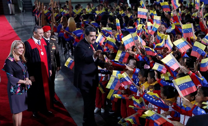 Venezuela's President Nicolas Maduro greets supporters prior to the ceremonial swearing-in for his second presidential term, at the Supreme Court in Caracas, Venezuela Jan. 10, 2019.