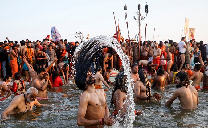 Naga Sadhus or Hindu holy men take dip during first 