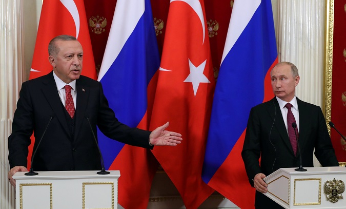 Russian President Vladimir Putin (R) and his Turkish counterpart Tayyip Erdogan (L) attend a news conference after their meeting at the Kremlin in Moscow, Russia January 23, 2019.