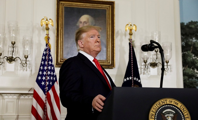 U.S. President Donald Trump arrives to deliver remarks on border security and the partial shutdown of the U.S. government in the Diplomatic Room at the White House in Washington, U.S.