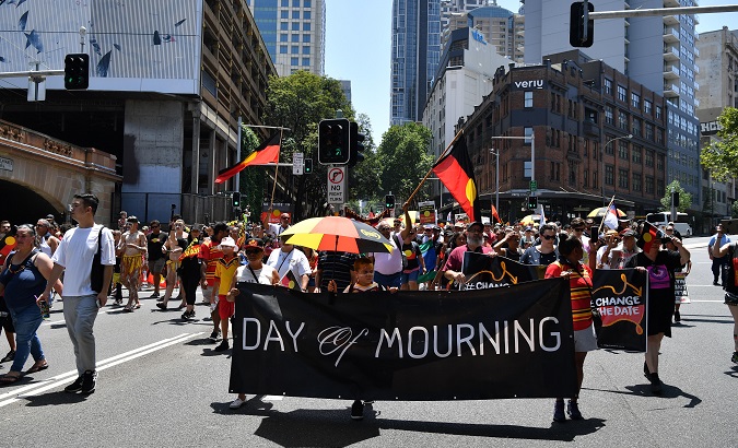 Protestors take part in an Invasion Day Rally on Australia Day in Sydney, Australia, Jan. 26, 2019.