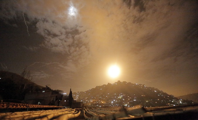 Syrian air defenses intercept Israeli missiles targeting an area in Damascus, Syria.