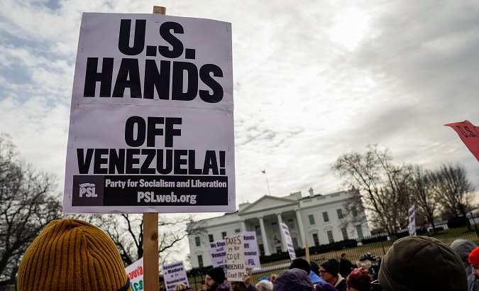 Anti-war and civil rights activists rally against Trump administration interference in Venezuela politics in front of the White House in Washington, U.S., January 26, 2019.