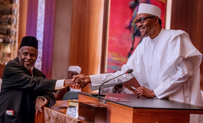 Nigeria's President Muhammadu Buhari swears in Tanko Mohammed as the acting Chief Justice in Abuja, Nigeria January 25, 2019