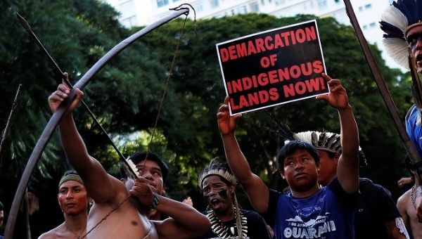Indigenous men take part in a protest against Brazil President Jair Bolsonaro's administration in Sao Paulo, Brazil, January 31, 2019.