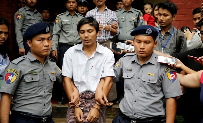 Journalists Wa Lone and Kyaw Soe Oo have been sentenced to seven years in jail in a landmark case that calls into question Myanmar's democracy.