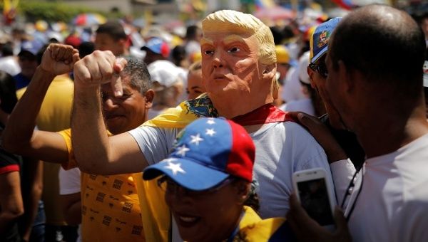 Venezuelan Opposition Rally With Israeli Flags, Trump Masks