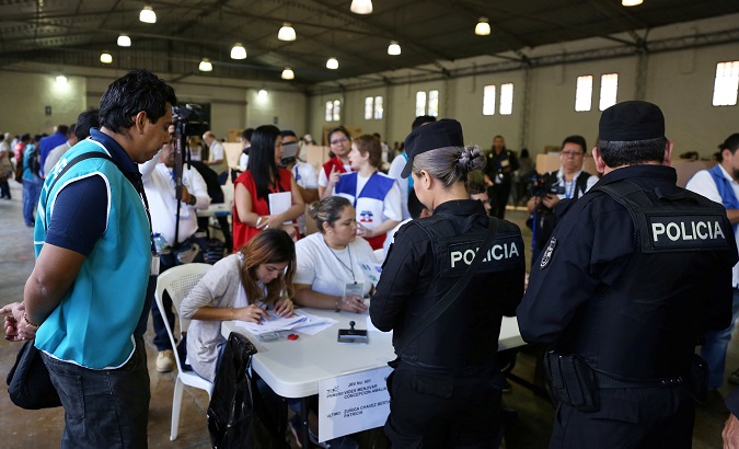 Police officers cast their votes during the presidential election in San Salvador, El Salvador, Feb. 3, 2019.