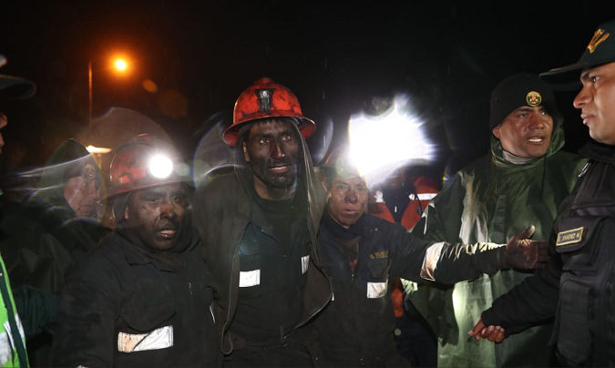 Rescue workers help free Peruvian coal miner after a mine shaft collapsed last week leaving four workers trapped for four days. They were rescued on Feb. 3