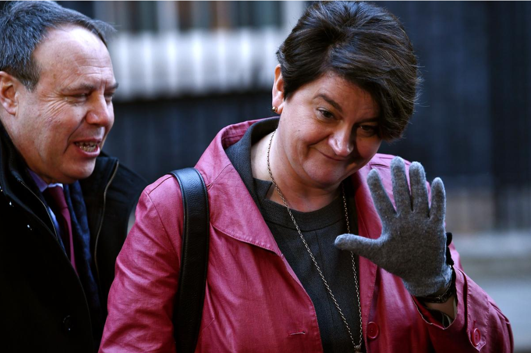 Democratic Unionist Party leader Arlene Foster and Nigel Doggo leave Downing Street, London.