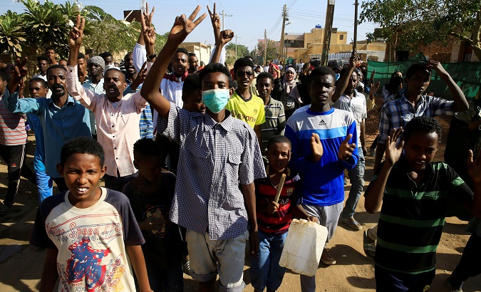 Sudanese demonstrators march during anti-government protests in Khartoum.