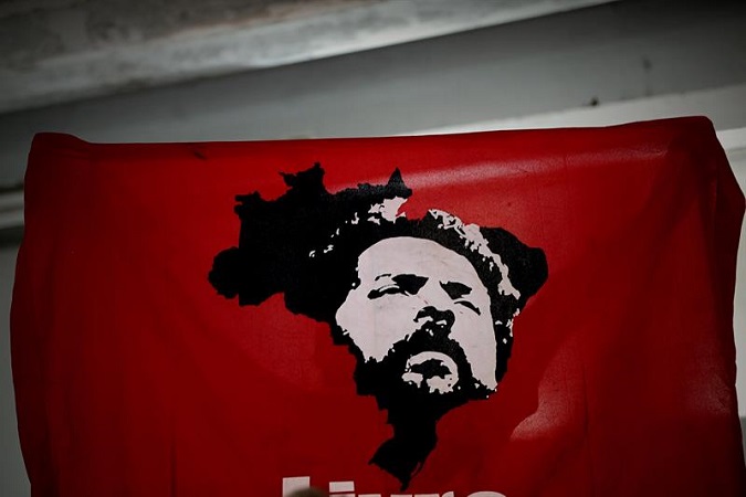 Lula da Silva on a flag held by a supporter