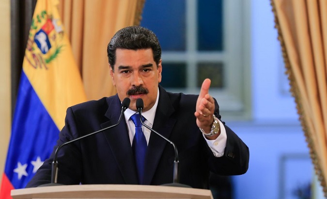 Venezuelan President Nicolas Maduro speaks during a press conference to international media at the presidential palace in Caracas.