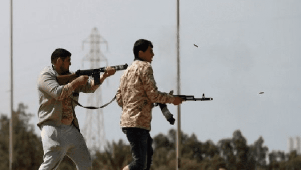 Fighters from Misrata fire weapons at Islamic State militants near Sirte March 15, 2015.
