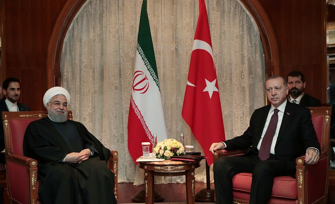 Turkish President Tayyip Erdogan meets with his Iranian counterpart Hassan Rouhani in Sochi, Russia, Feb. 14, 2019.