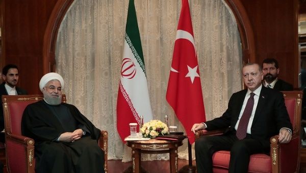 Turkish President Tayyip Erdogan meets with his Iranian counterpart Hassan Rouhani in Sochi, Russia, Feb. 14, 2019.