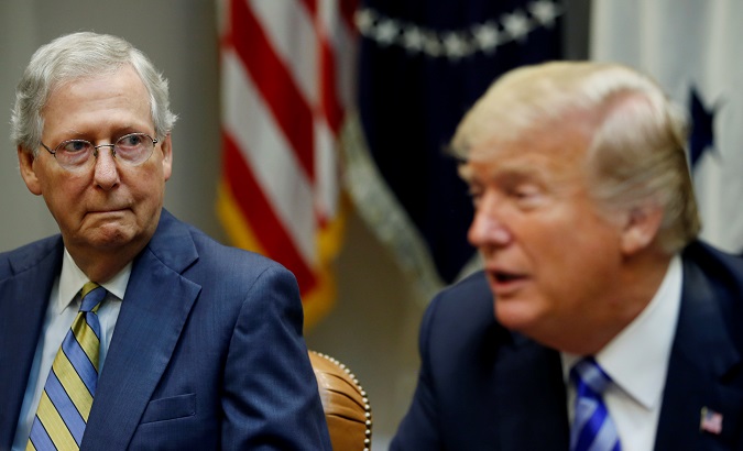 Senate Majority Leader Mitch McConnell listens to U.S. President Donald Trump as the President holds a meeting with Republican House and Senate leadership in the Roosevelt Room at the White House in Washington, D.C., U.S. Sept. 5, 2018.