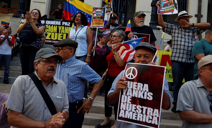 People against U.S. military intervention in Venezuela gathered in front of the Federal Court, Old San Juan, Puerto Rico, Feb. 14, 2019.