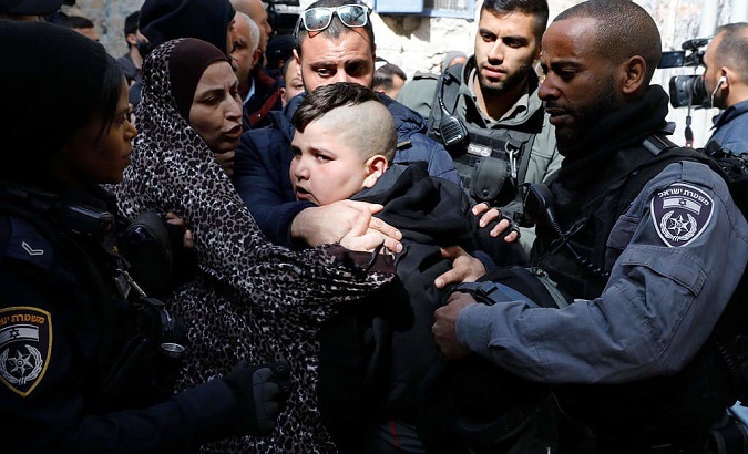 A Palestine kid is being harassed by Israeli police when he protested against his family's eviction.