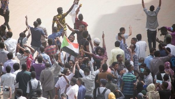 Sudanese demonstrators march during an anti-government protest in Khartoum.