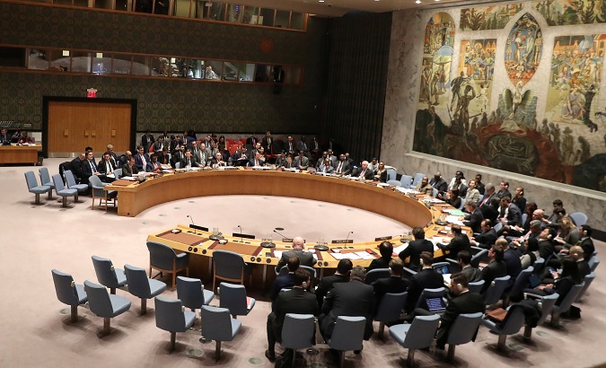 Members of the United Nations Security Council gather during a meeting about the situation in Venezuela, in New York.