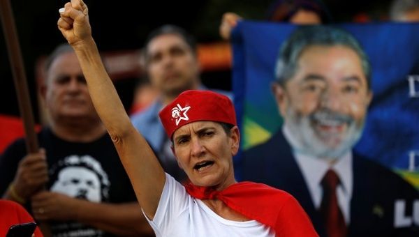 A supporter of Brazil's former President Luiz Inacio Lula da Silva reacts in Curitiba, Brazil, Feb. 7, 2019.