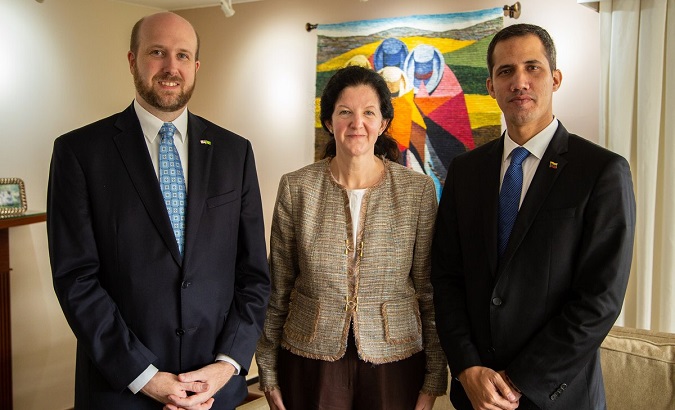 Juan Guaido and Kimberly Breier pose for a photo with Brazilian officials during his visit to Brazil earlier this week.
