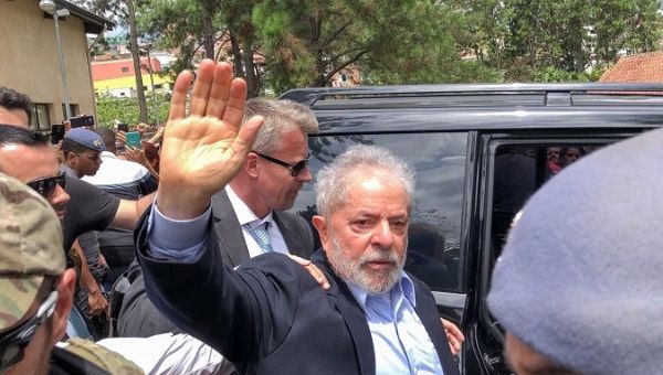 Brazil's former President Luiz Inacio Lula da Silva, leaves for the cemetery to attend the funeral of his 7-year-old grandson, in Sao Bernardo do Campo, Brazil Mar. 2, 2019.
