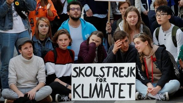 Greta Thunberg (C) takes part in a protest in Paris, France, Feb. 22, 2019.