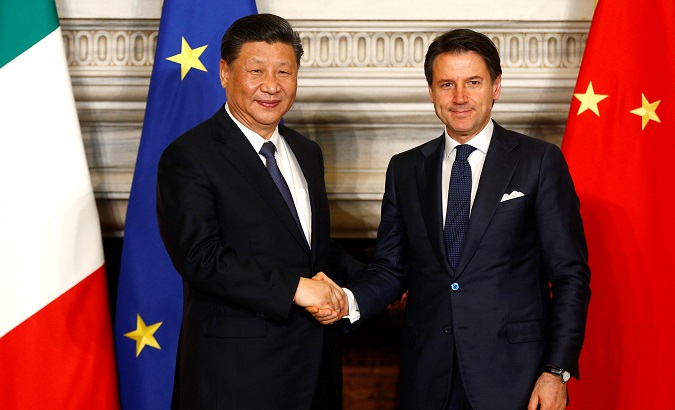 Prime Minister Giuseppe Conte and President Xi Jinping shake hands after signing trade agreements in Rome, Italy, March 23, 2019.