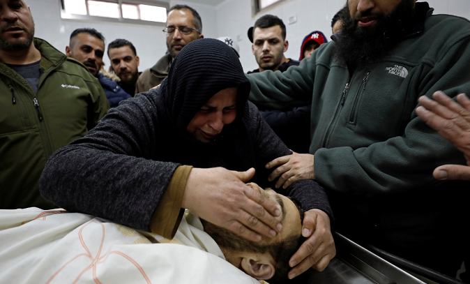 Mother of Palestinian Mohamad Edwan, killed during an Israeli raid, mourns her son at a hospital in Ramallah, in the Israeli-occupied West Bank