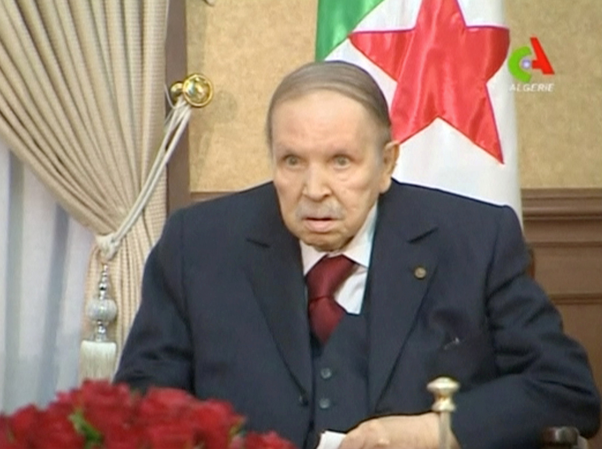 President Abdelaziz Bouteflika gestures during a swearing-in ceremony in Algiers
